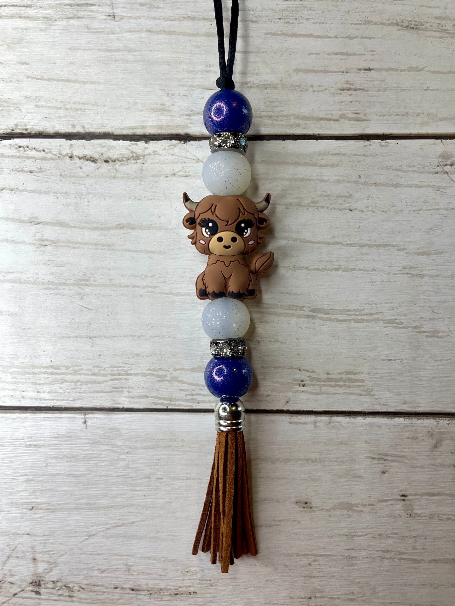 Highland cow car charm (blue beads )