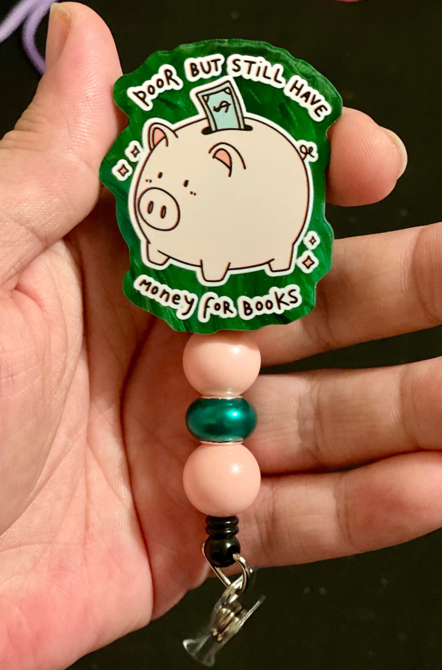 Poor but still have money for books badge reel