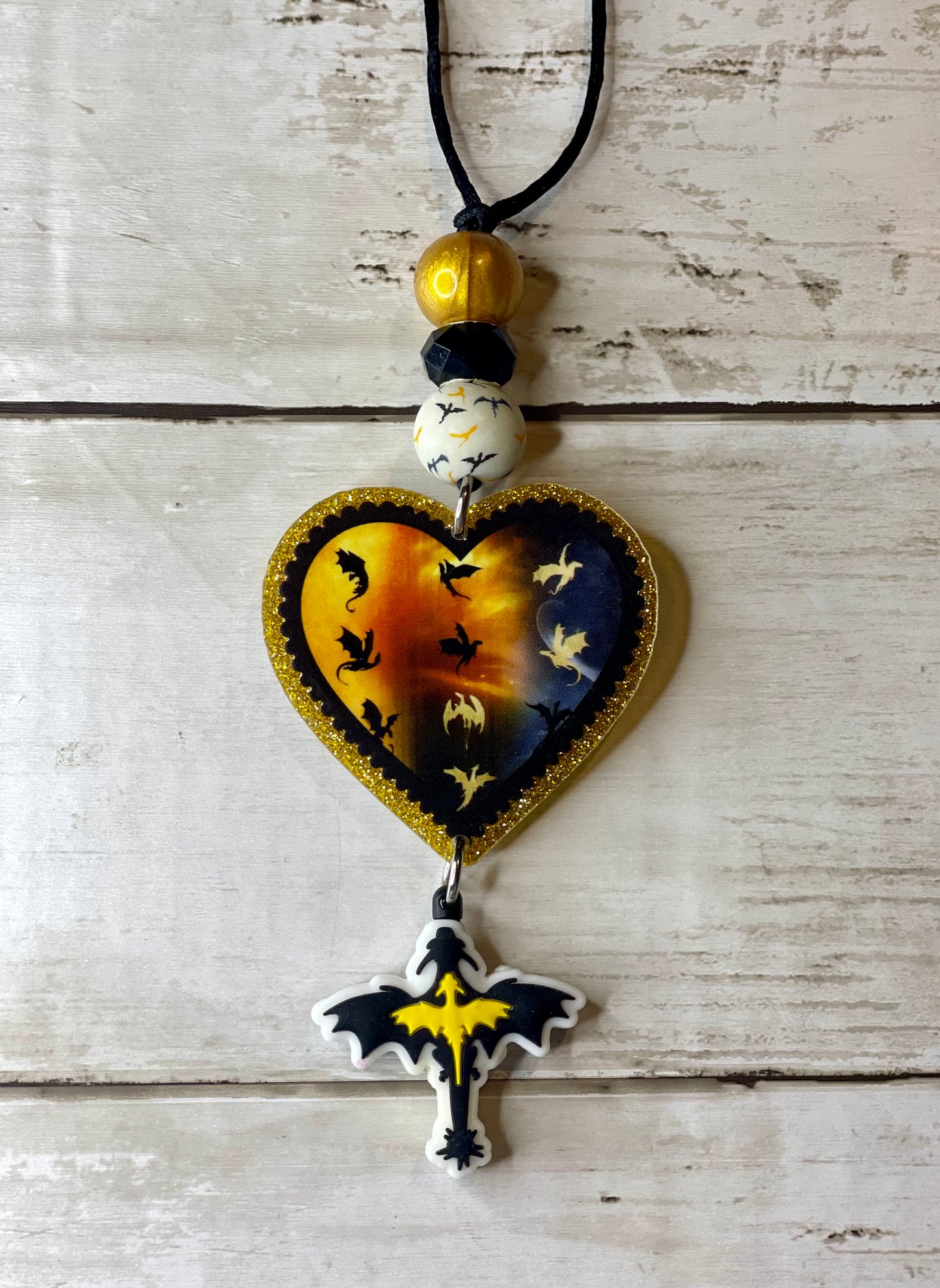 Book cover dragons car charm