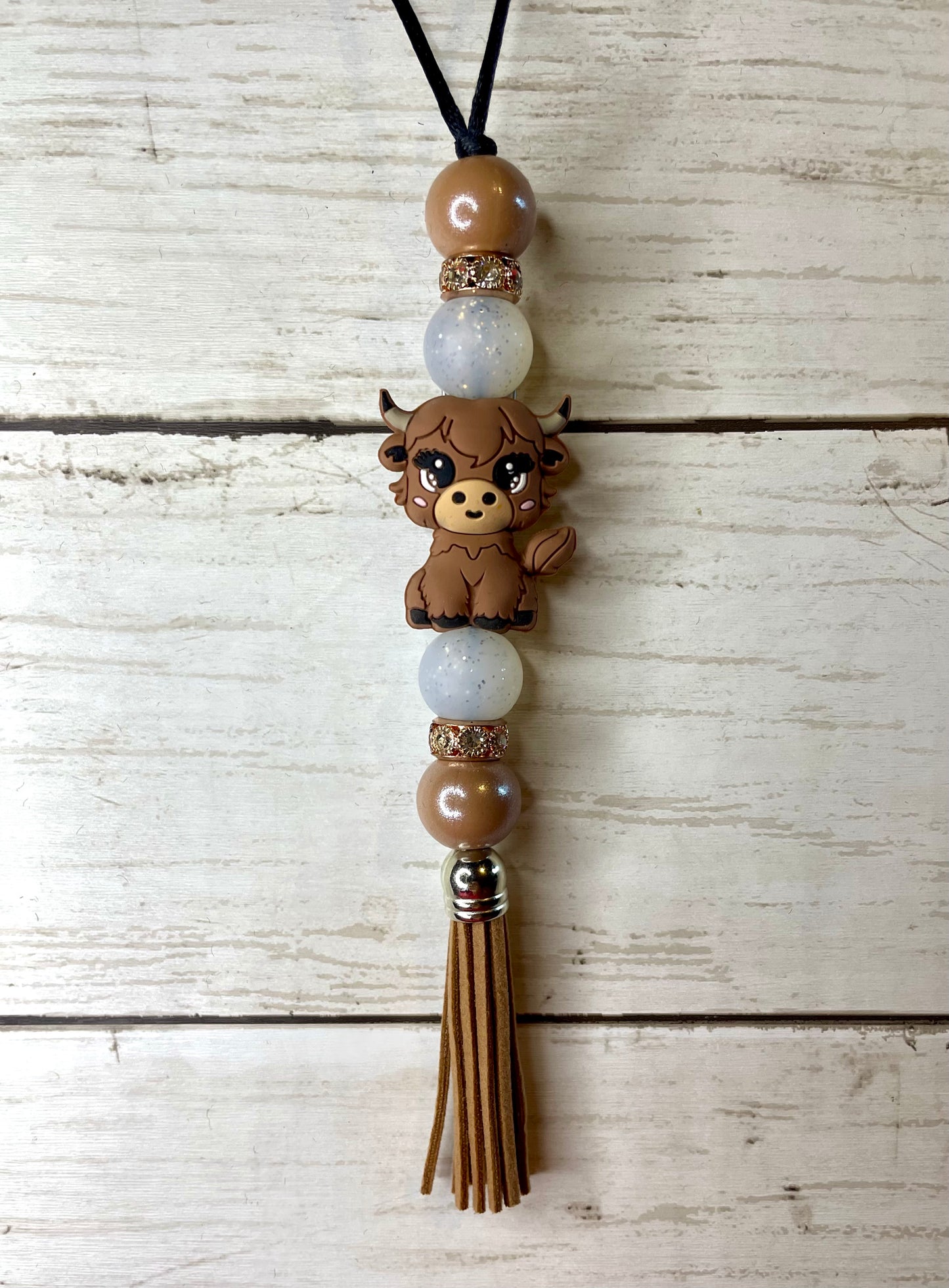 Highland cow car charm (brown beads)