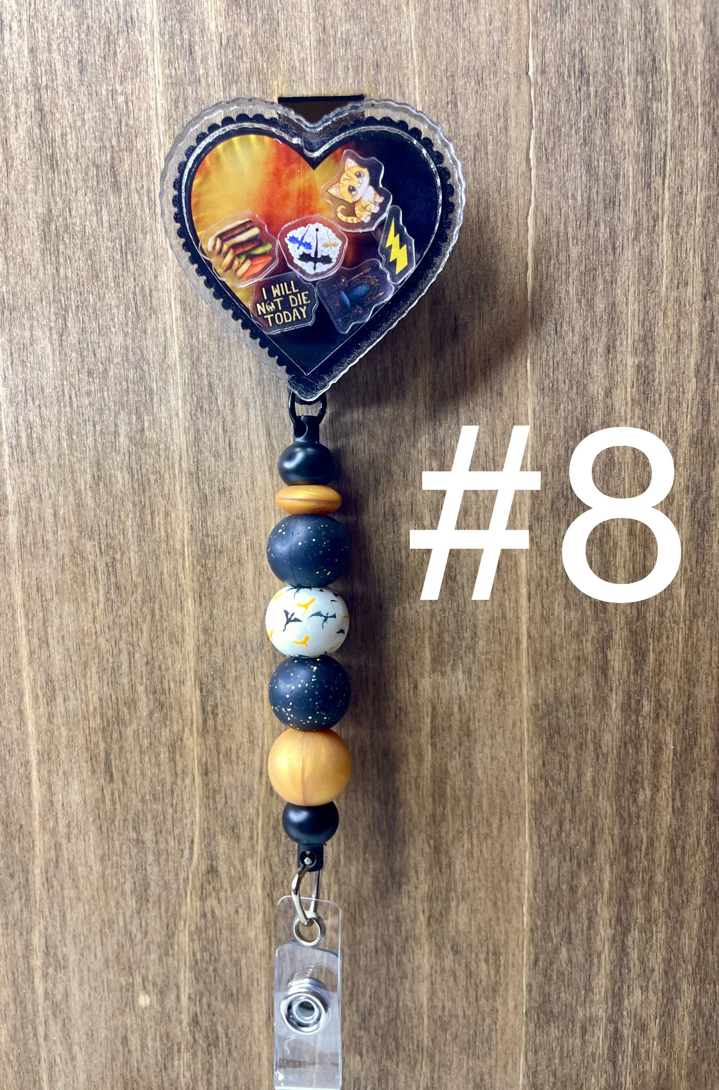 Fourth wing shaker badge reel