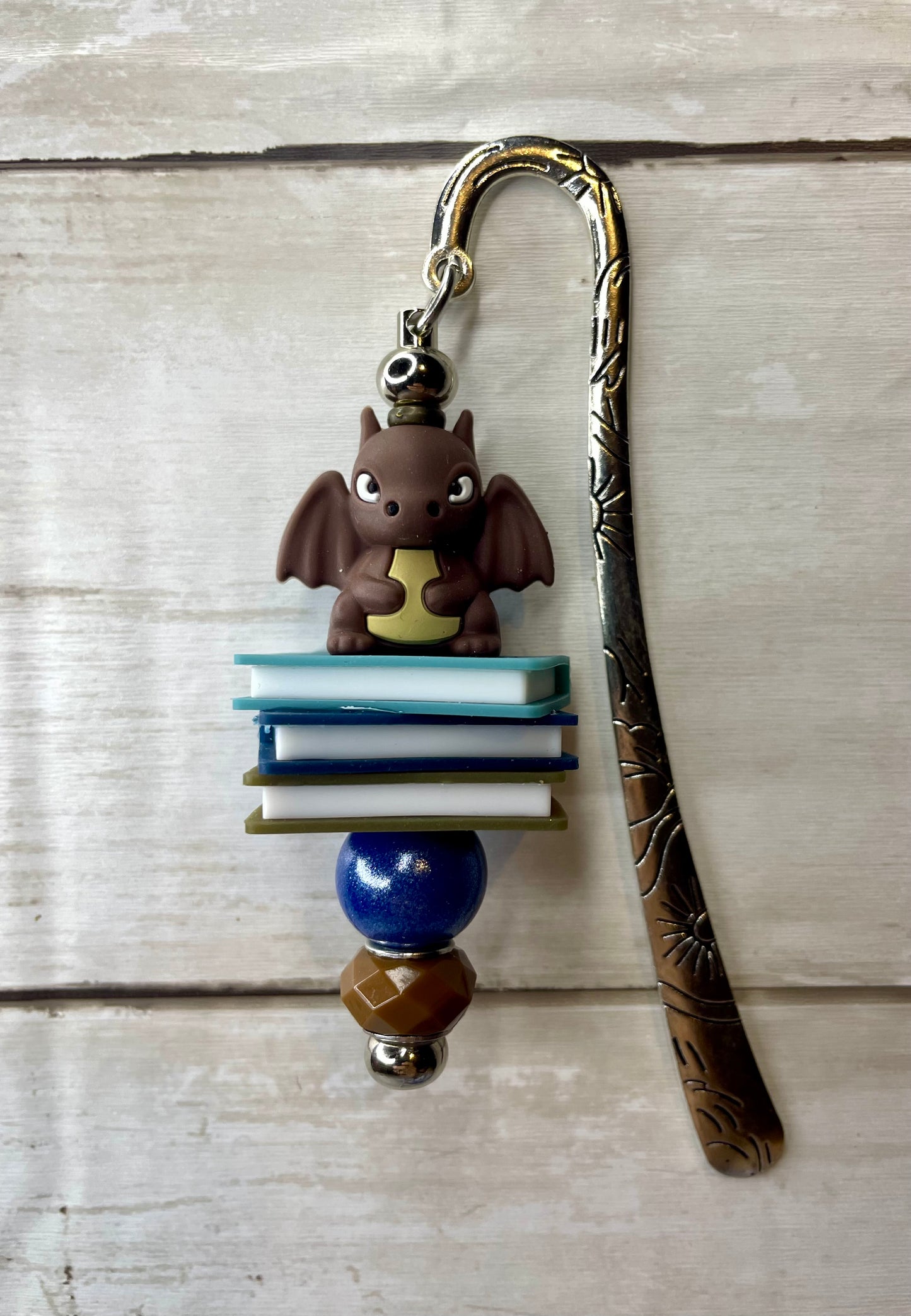 Brown book dragon bookmark