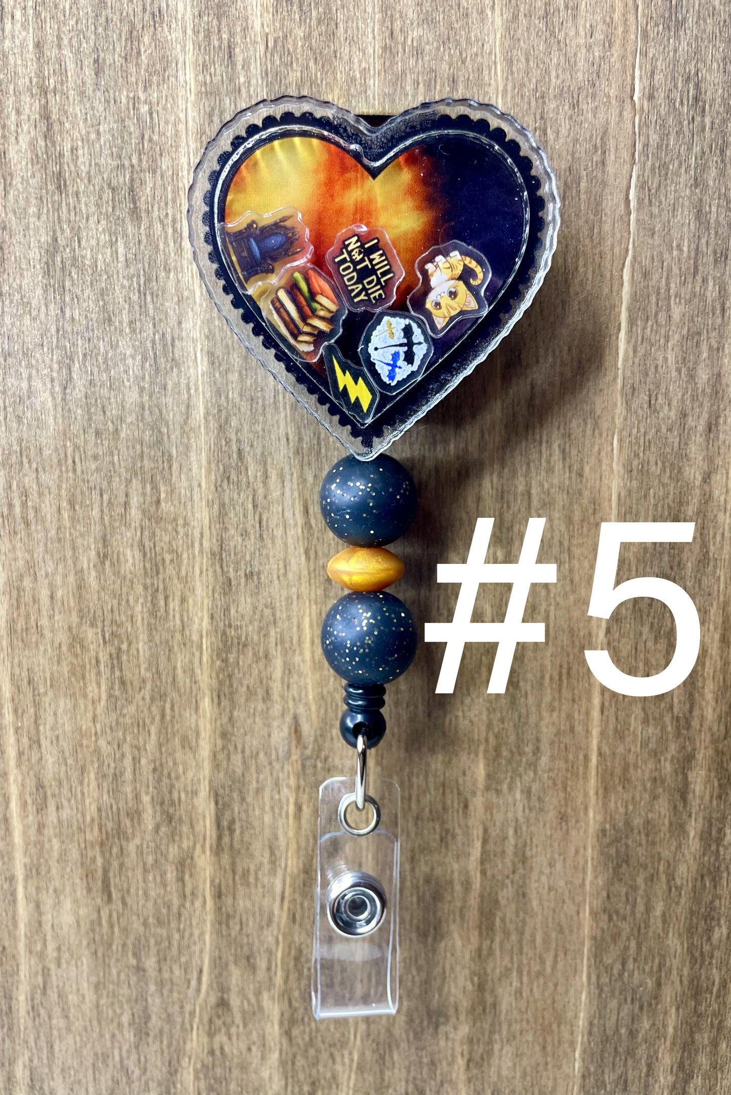 Fourth wing shaker badge reel