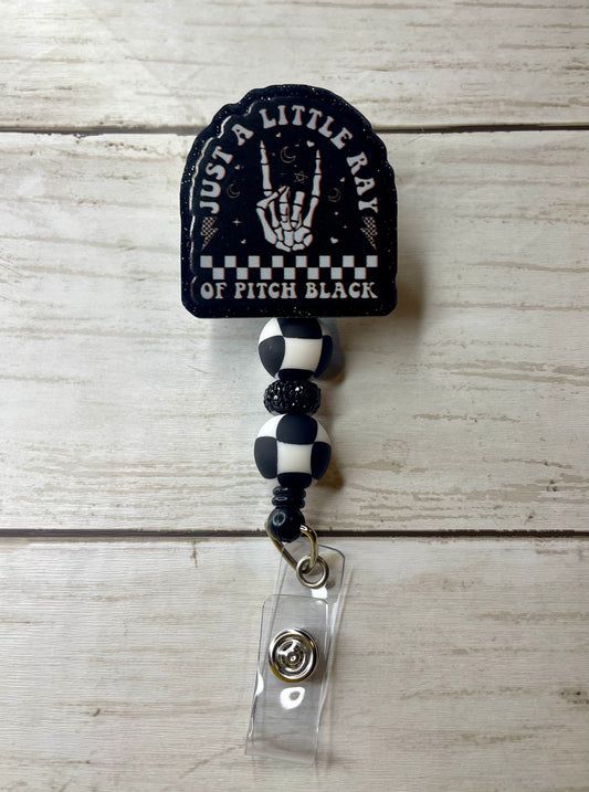 Pitch black badge reel