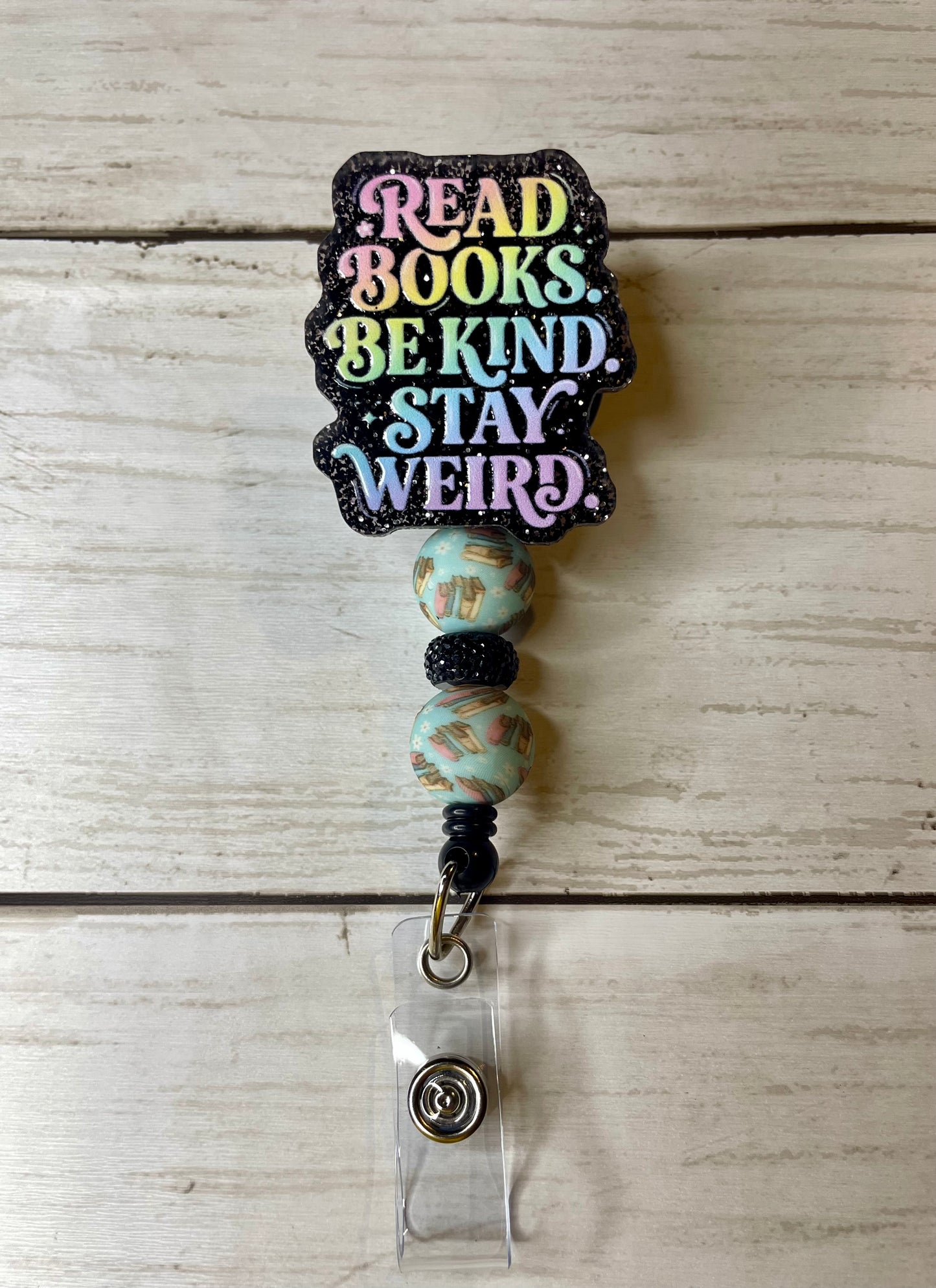 Read books. Be kind. Stay weird. Badge reel