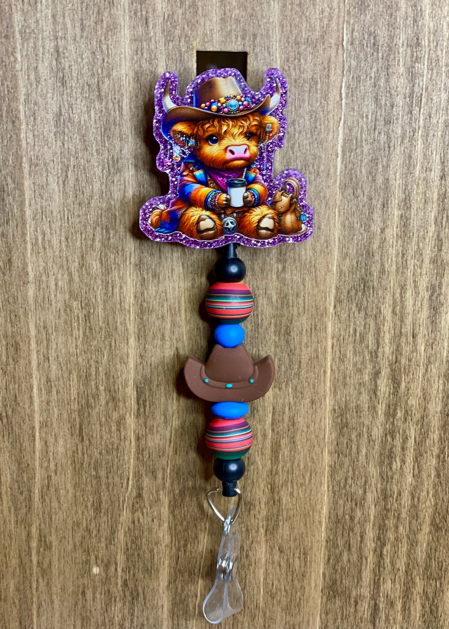 Highland cow with hat