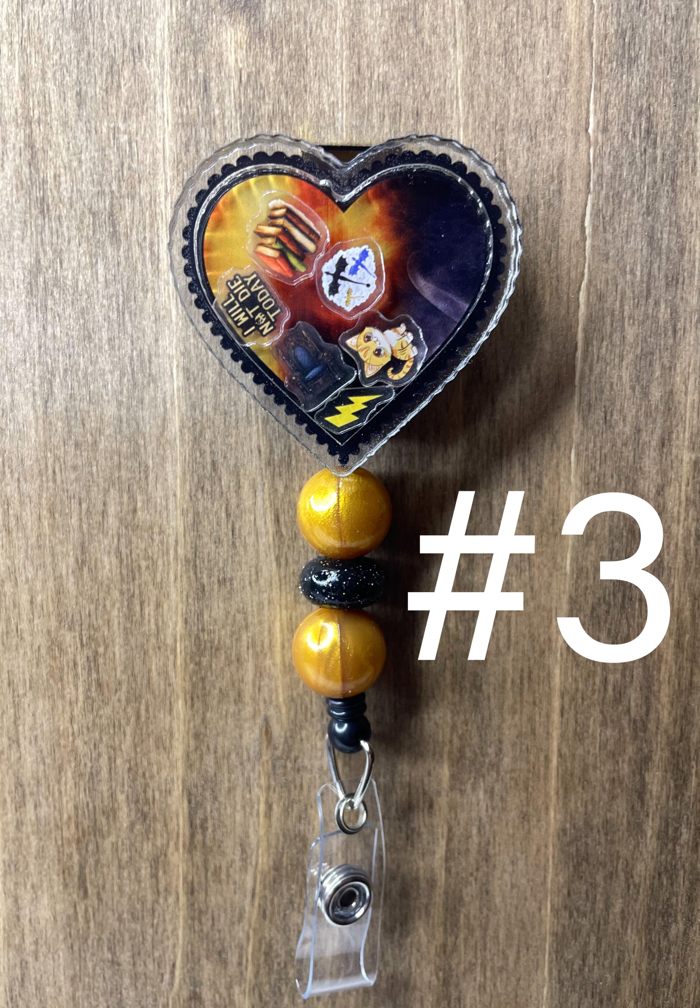 Fourth wing shaker badge reel