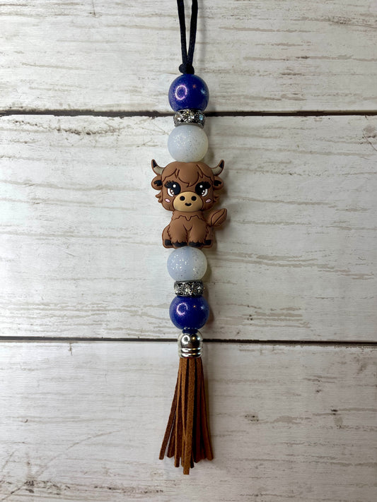 Highland cow car charm (blue beads )