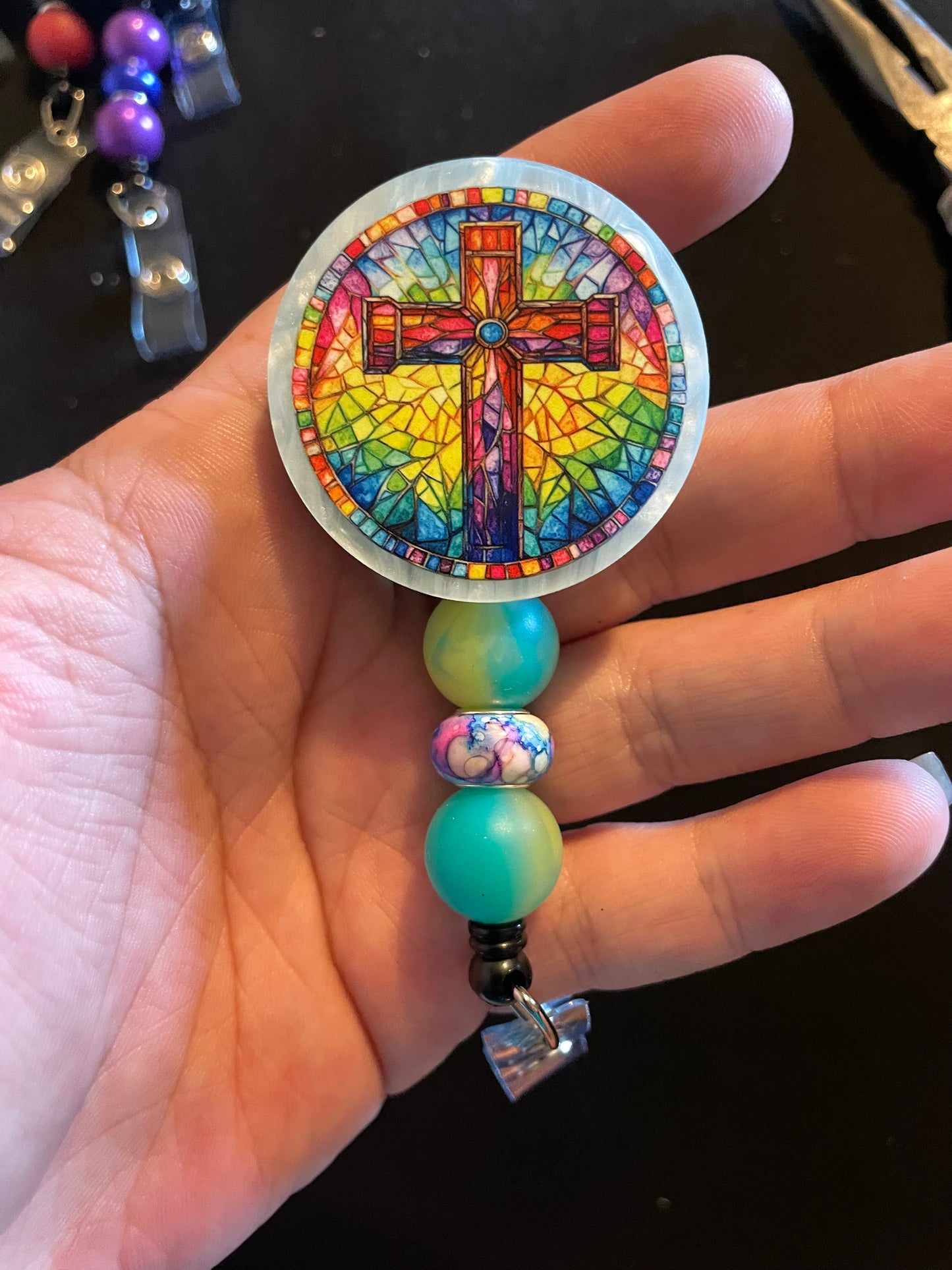 Stained glass cross badge reel