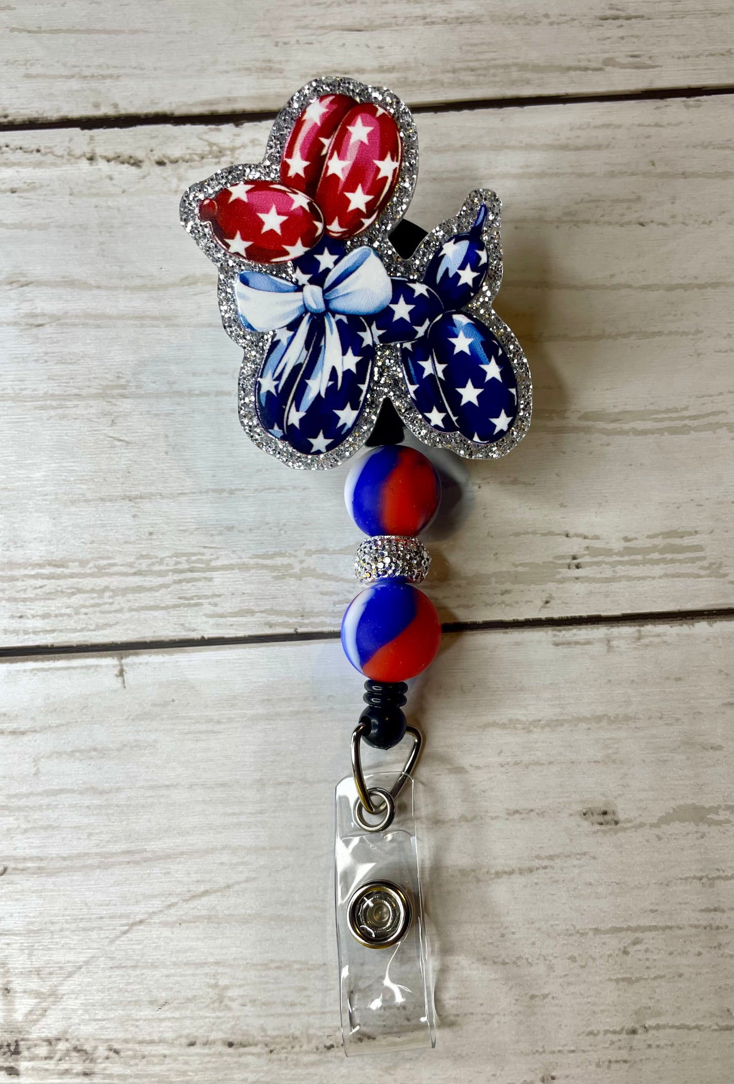 Patriotic balloon dog badge reel