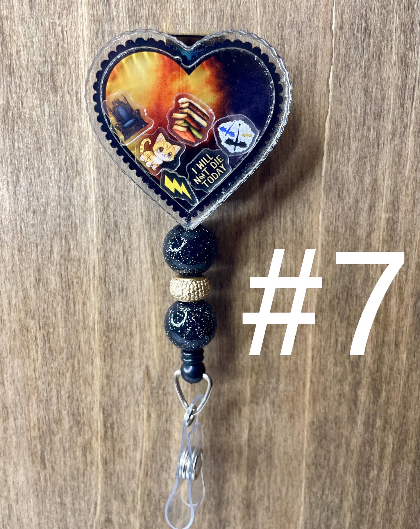Fourth wing shaker badge reel